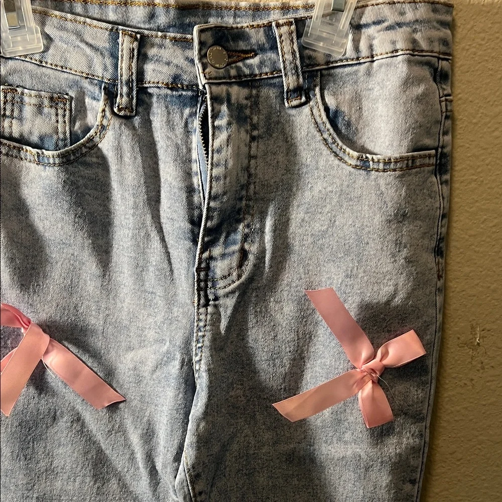 SHEIN Light Blue Jeans with Pink Bow Accents